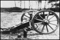 Krupp 12cm rapid fire gun with shell displayed